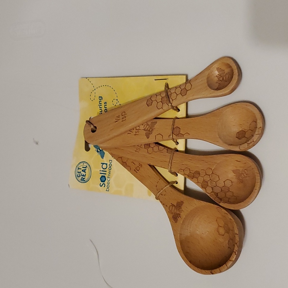 Talisman designs measuring spoons